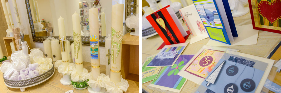 In Handarbeit gestaltete Kerzen und Grußkarten aus der Kreativwerkstatt